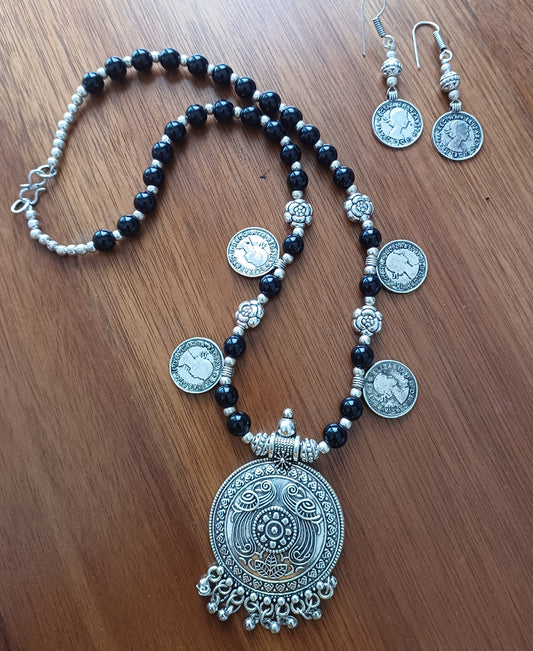 Advaita Handicrafts - Silver German Oxidized Necklace with Silver & Black Beads and Coins with Earrings.