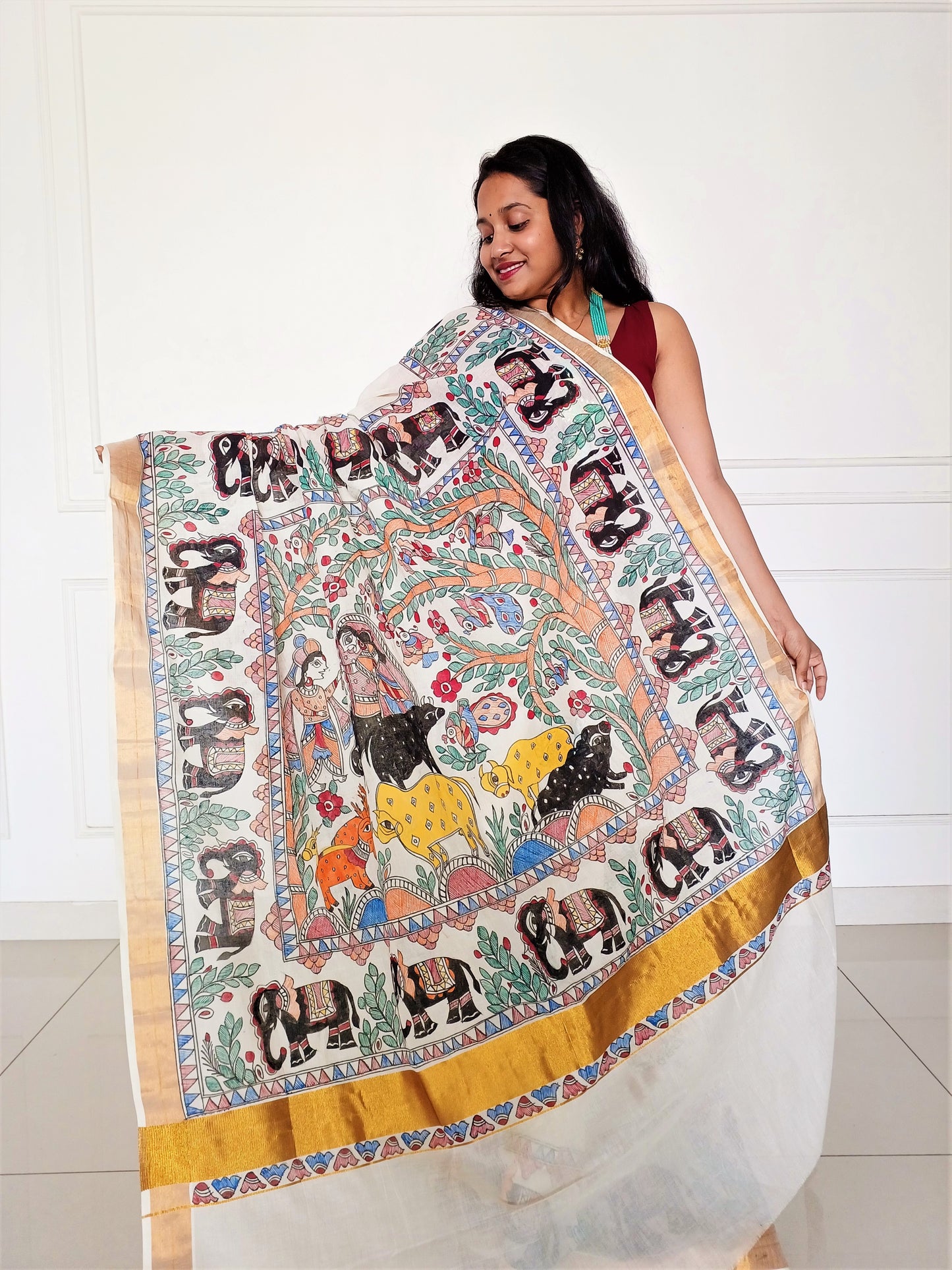 Advaita Handicrafts hand painted Madhubani Saree - Click for variety.
