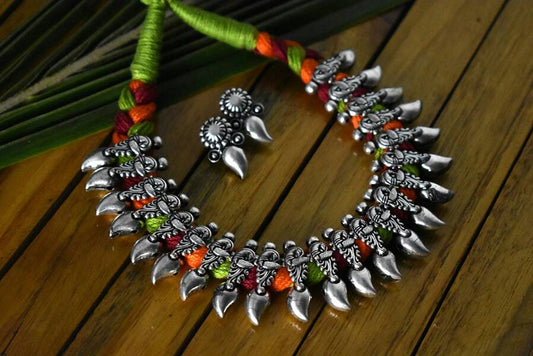 Advaita Handicrafts Oxidised German Silver Multi Colour Thread Necklace with Earrings