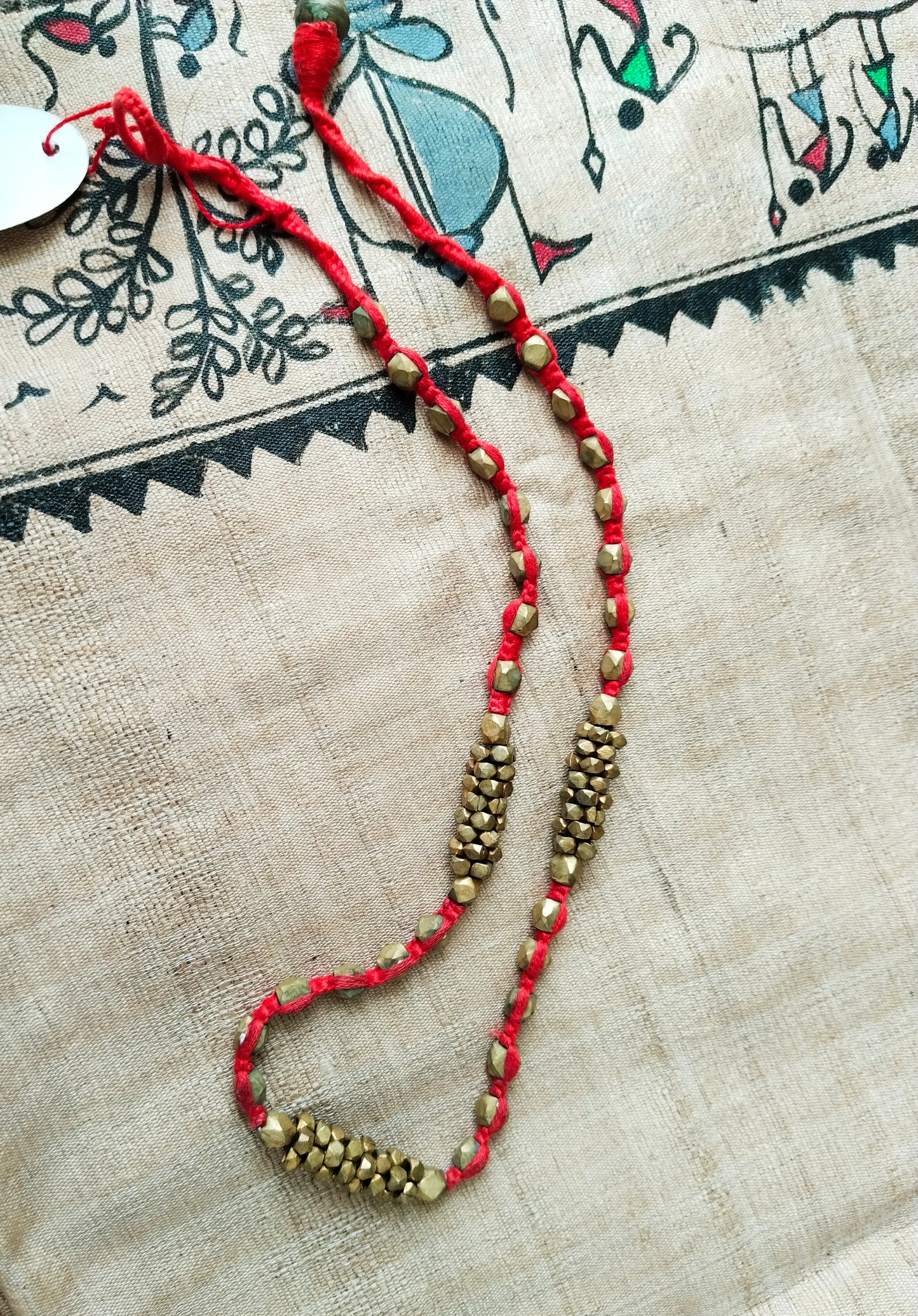 Advaita Handicrafts Ethnic Collection - Red Thread with Golden Brass Dhokra Beads Long Necklace.