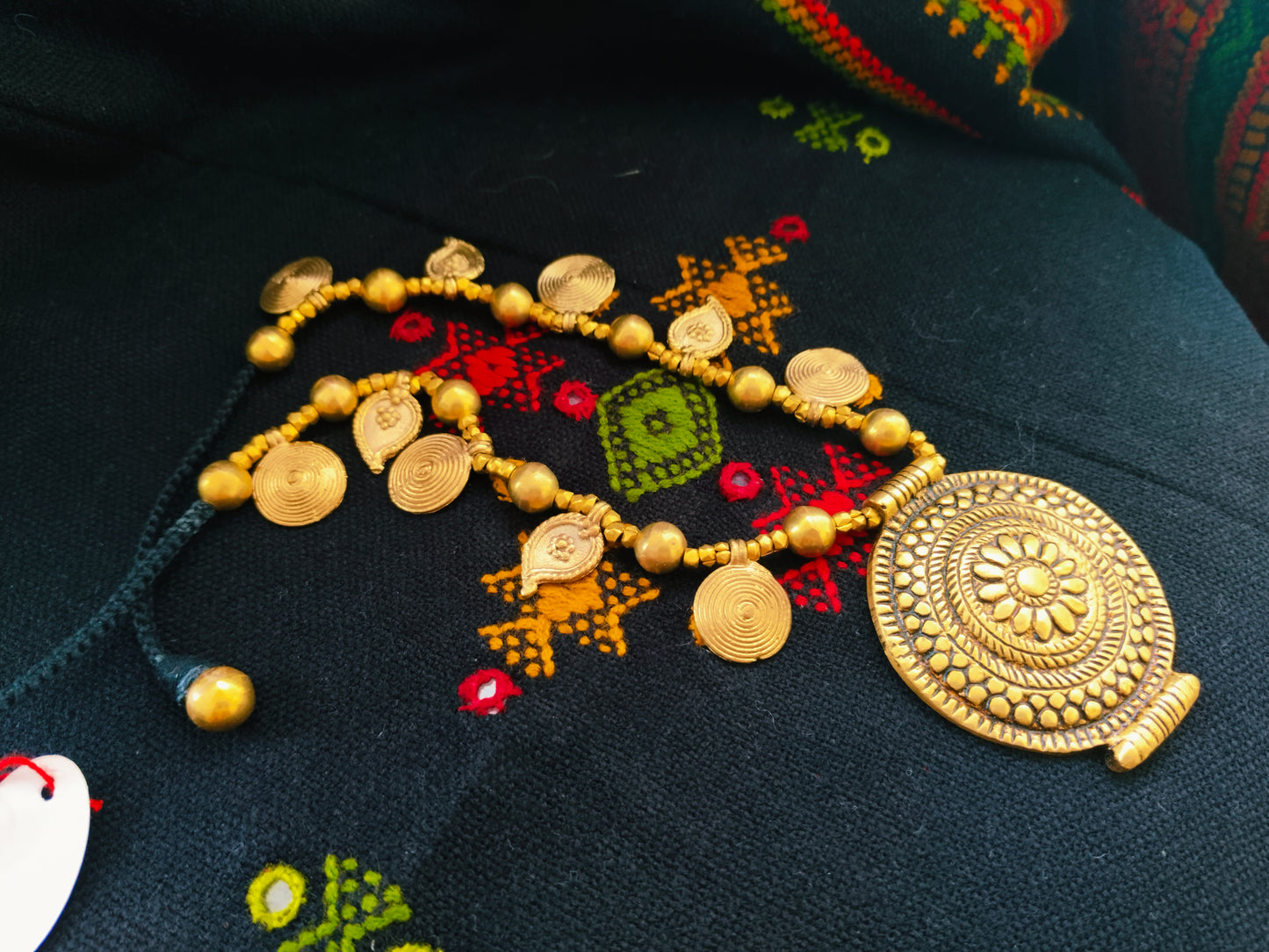 Flower pendant with tribal motifs - True tribal quirky necklace