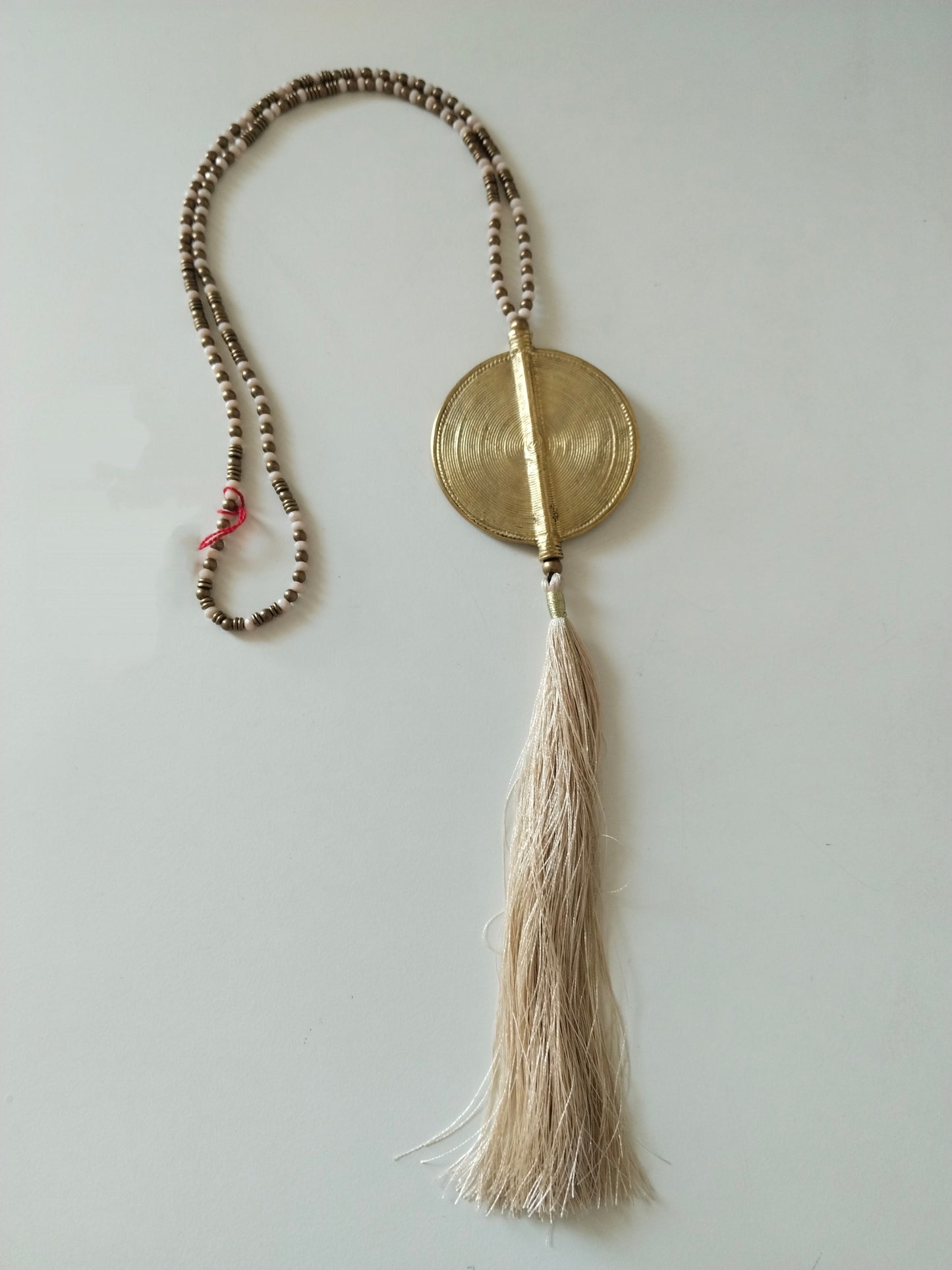 Off-White Tassel and Bead Necklace with Brass Large Disc Pendant