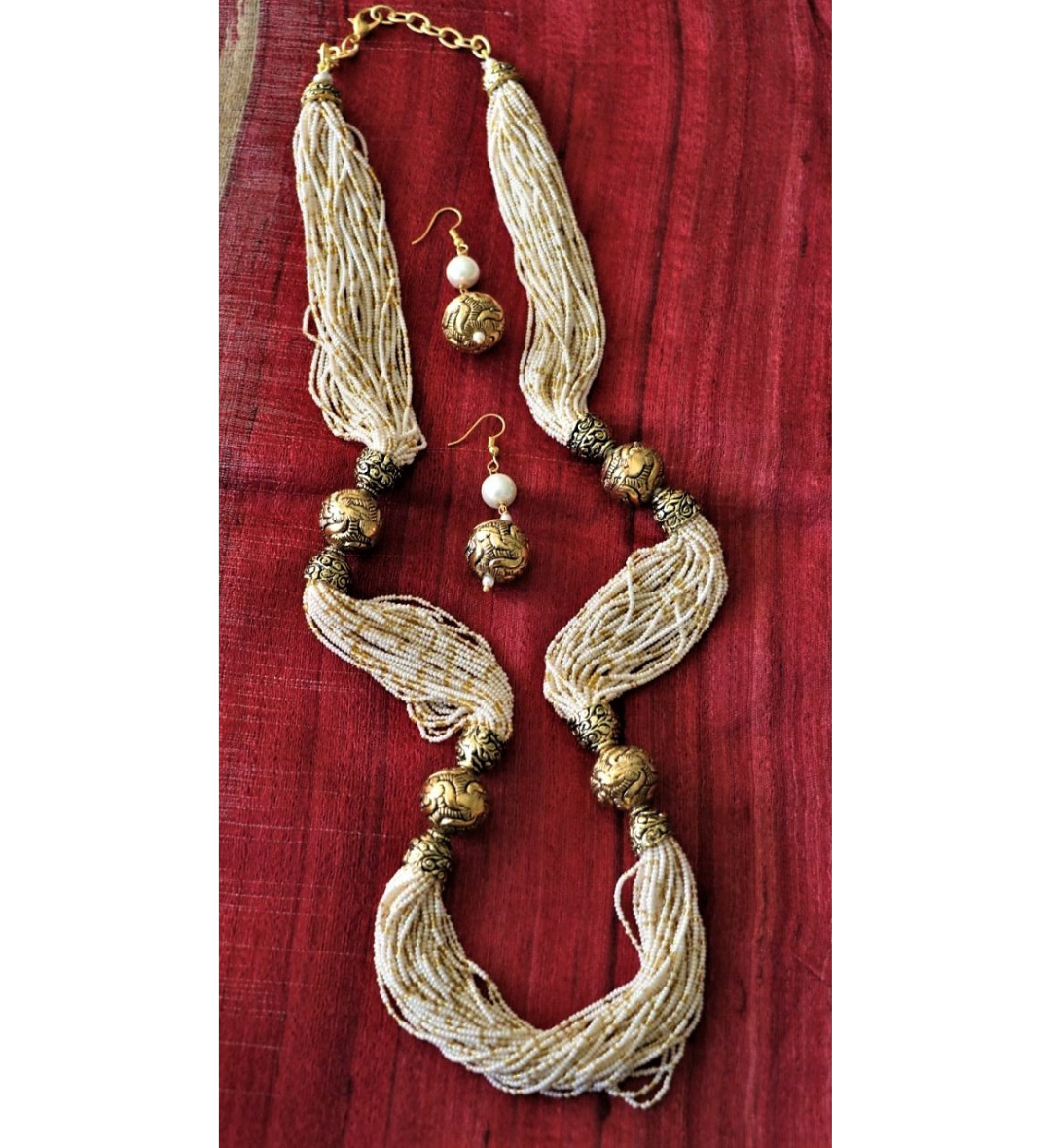 Advaita Handicrafts White multi strand antique beads necklace set