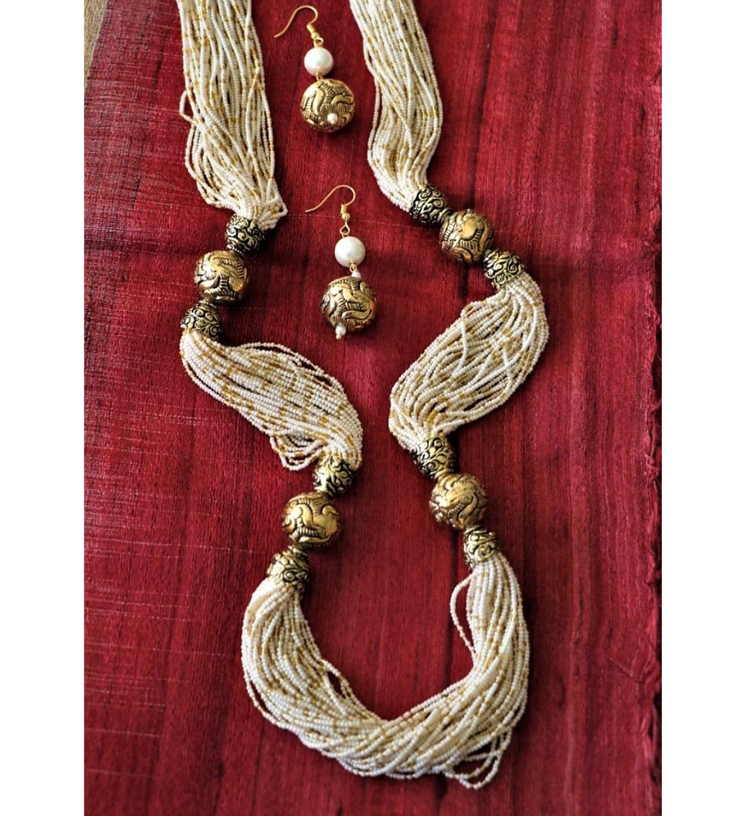 Advaita Handicrafts White multi strand antique beads necklace set