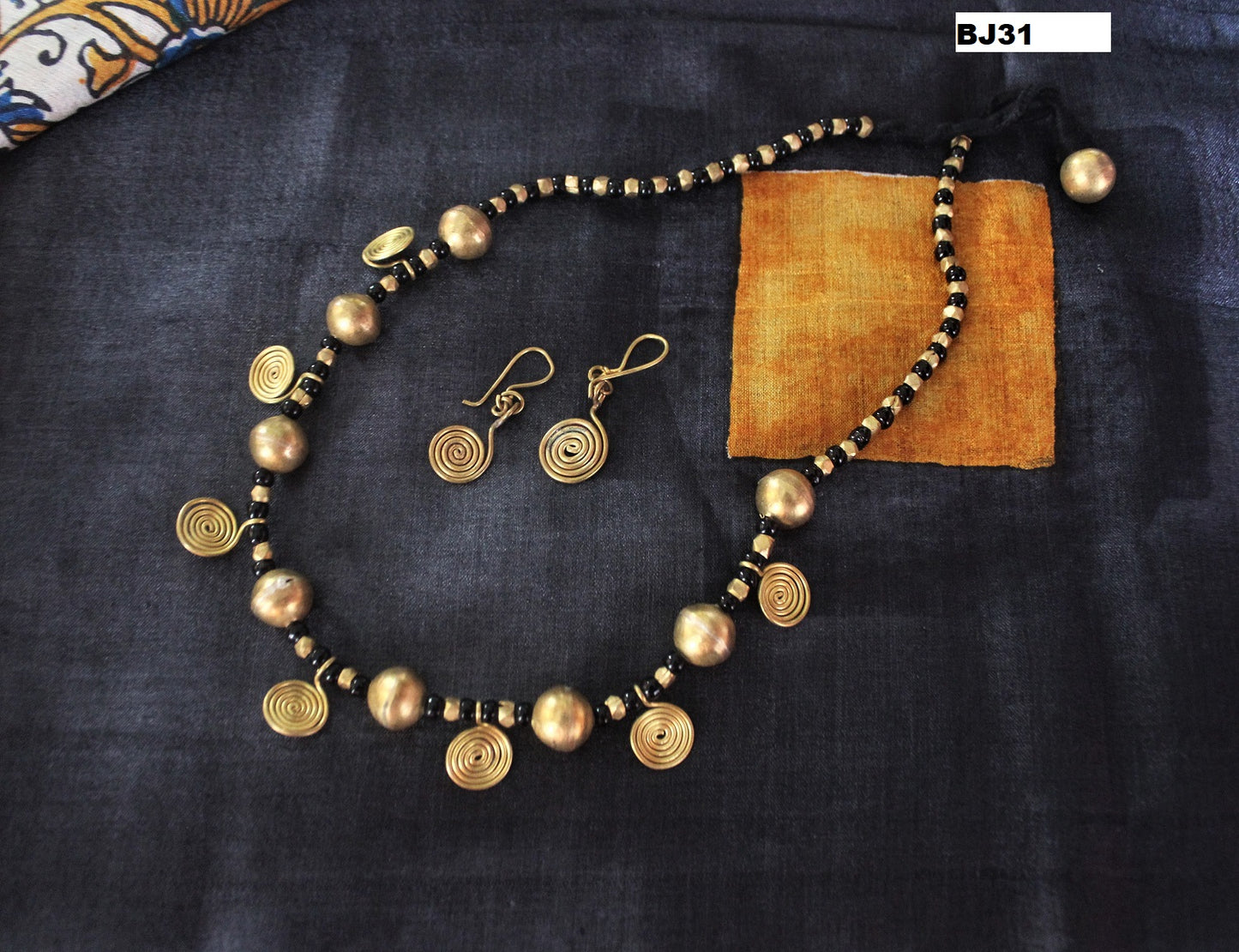 Advaita Handcrafts single line Tribal Necklace Set.