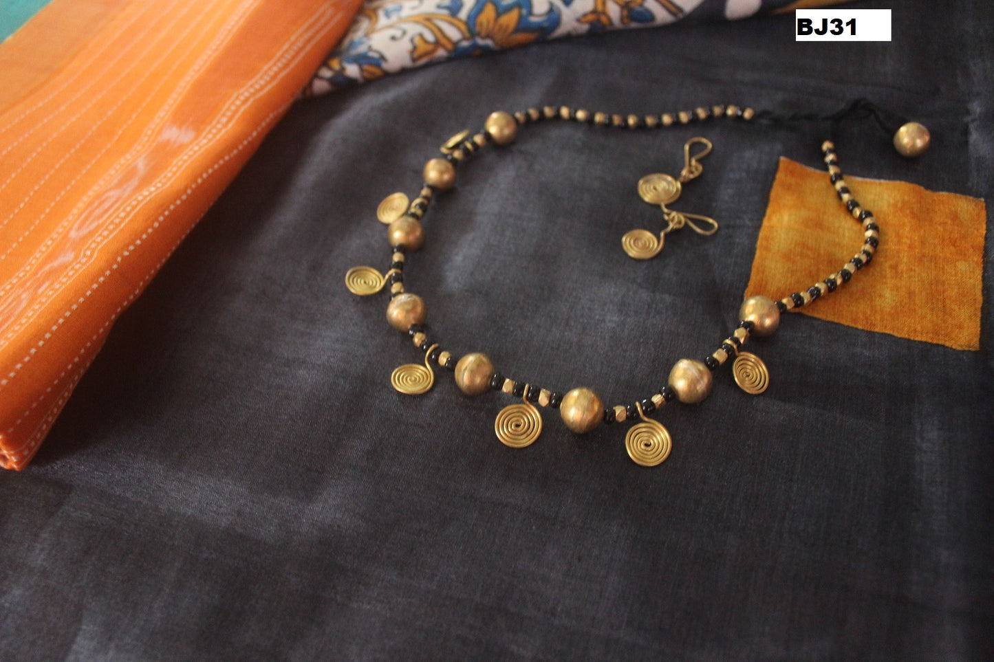 Advaita Handcrafts single line Tribal Necklace Set.