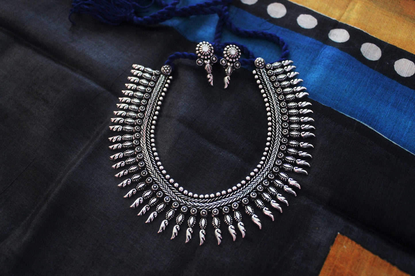 Advaita Handicrafts Pointed beads collar style German Silver Necklace Set.