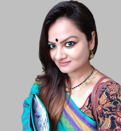 Spiral brass disk necklace