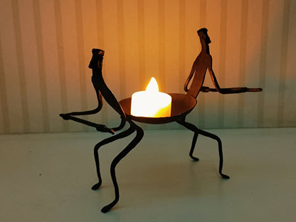 Wrought Iron Men holding diya