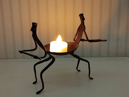 Wrought Iron Men holding diya