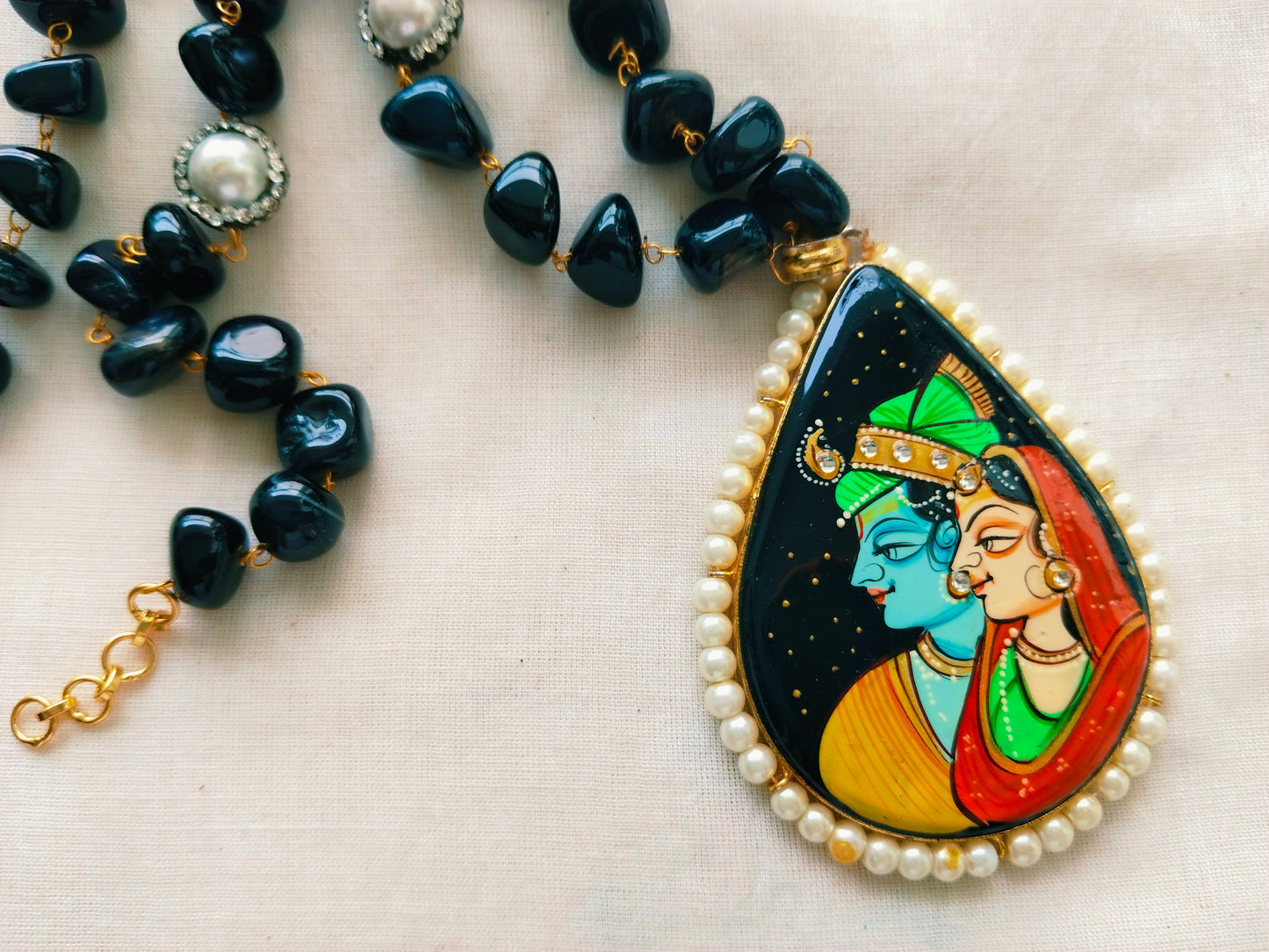 Advaita Handcrafts - Hand-painted Radha Krishna Pearl Pendant.