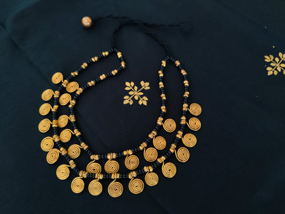 Double layered spiral brass and bead necklace