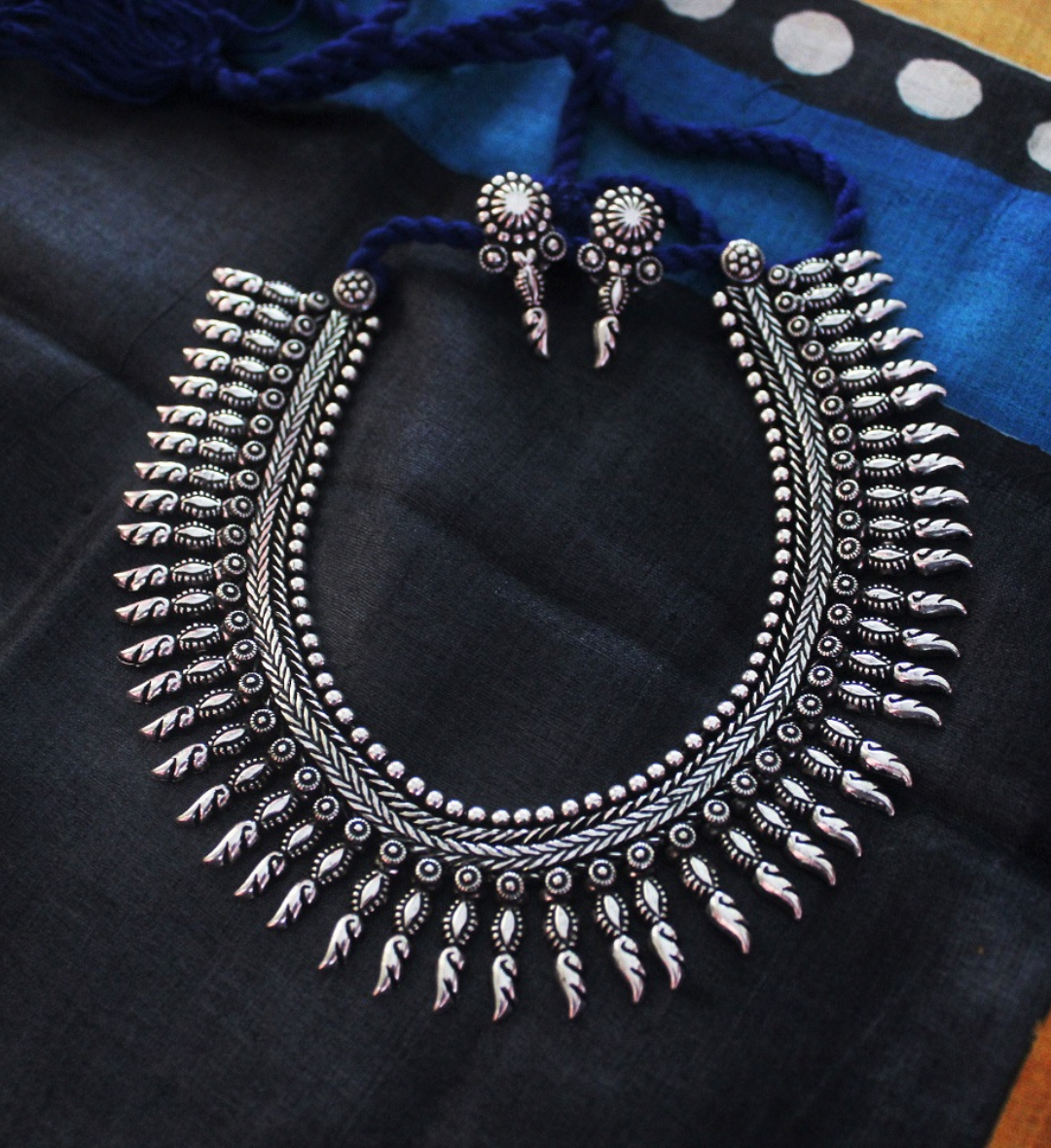 Advaita Handicrafts Pointed beads collar style German Silver Necklace Set.