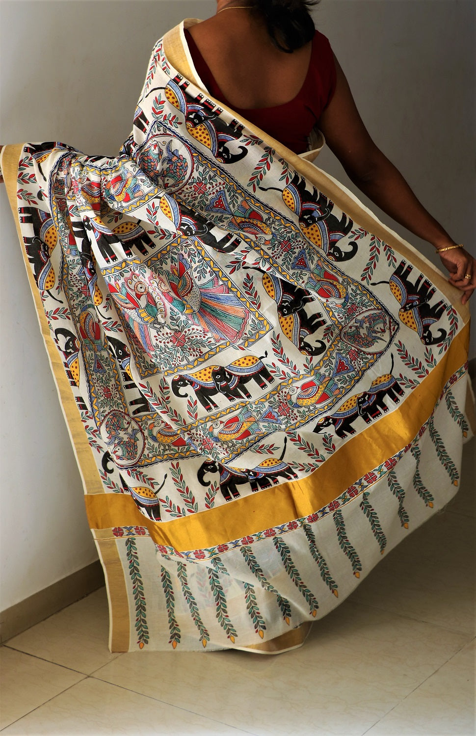 Advaita Handicrafts hand painted Madhubani Saree - Click for variety.