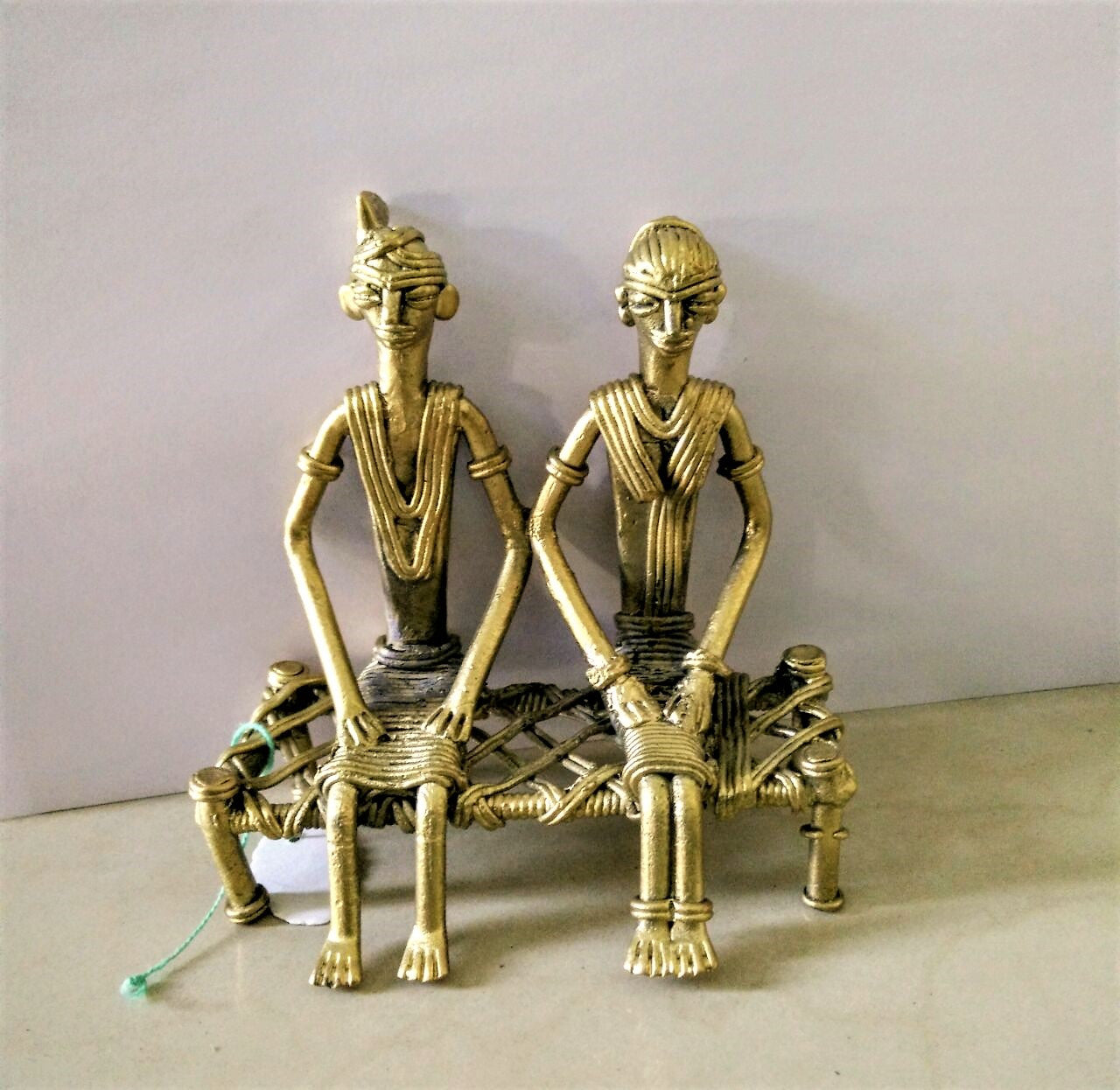 Dhokra Couple on cot