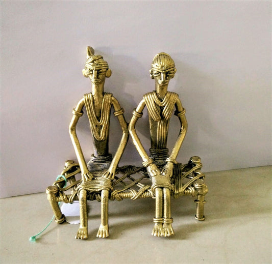 Dhokra Couple on cot