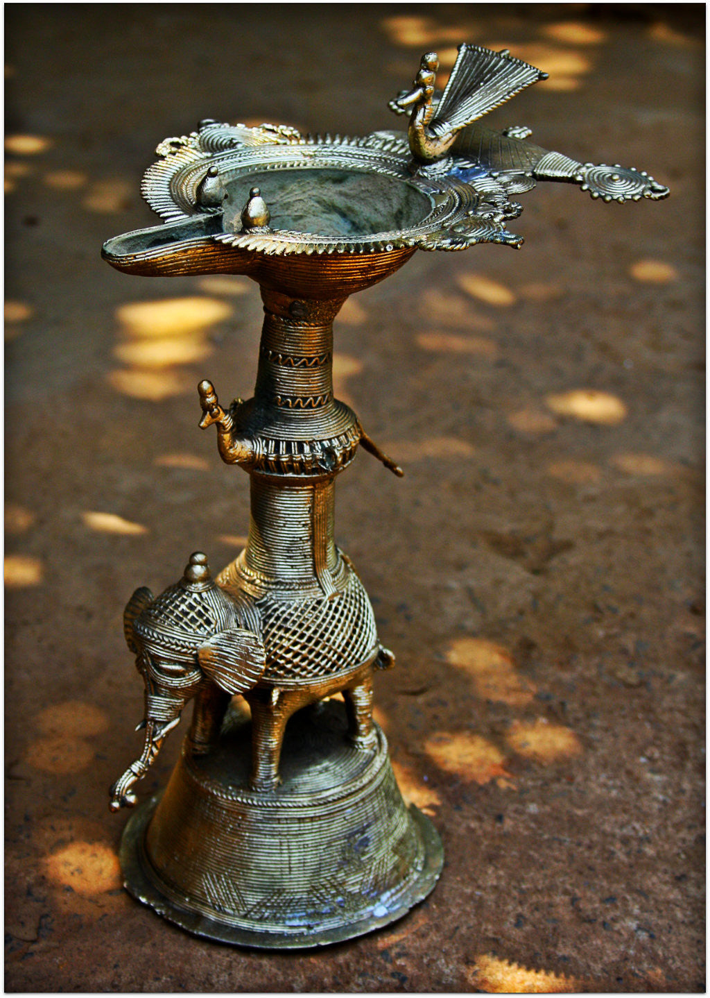 Intricate Dhokra carved Samayi/ Lamp - 8 inches (approx)