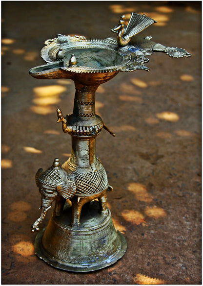 Intricate Dhokra carved Samayi/ Lamp - 8 inches (approx)