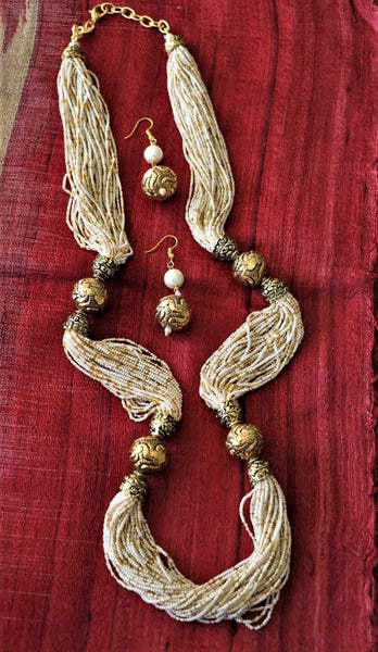 Advaita Handicrafts White multi strand antique beads necklace set