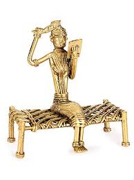 Decorative brass statue of Lady on cot combing hair/Reading/  Dhokra figurine of lady combing her hair